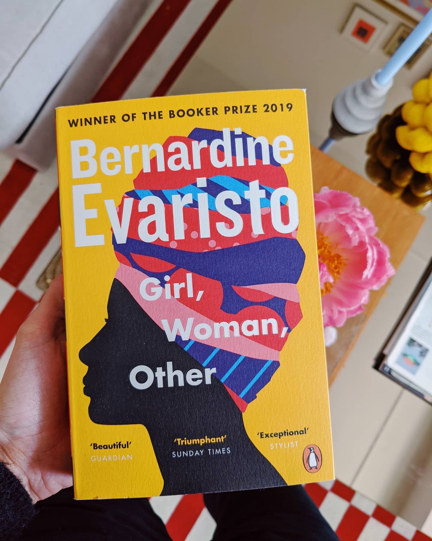 I'm only halfway through, but I cannot wait to recommend #BernadineEvaristo's GIRL, WOMAN, OTHER. It follows 12 characters (one in each chapter), most of them black British womxn, learning how to be. They all may be pretty different, they make different decisions, even live in different decades, make different experiences - but they are connected and united in feeling it all. The struggle, the fear, the hope, the confusion, the anger, the sisterhood. They're old, they're young, they're rebellious and shy, poor and rich, they love men and women. And they should be heard. Not only that Evaristo's 8th book teaches us empathy - but so much more. #GirlWomanOther is about listening and (un)learning. It's about racism, gender identity, politics and heartache, about feminism, class, sexuality and - life. It's a poem. It's experimental. It is, indeed, a breath-taking symphony.